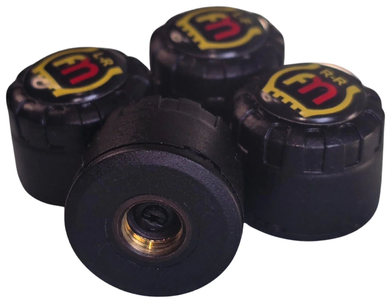 External tyre sensors, one turned over to show its brass thread.